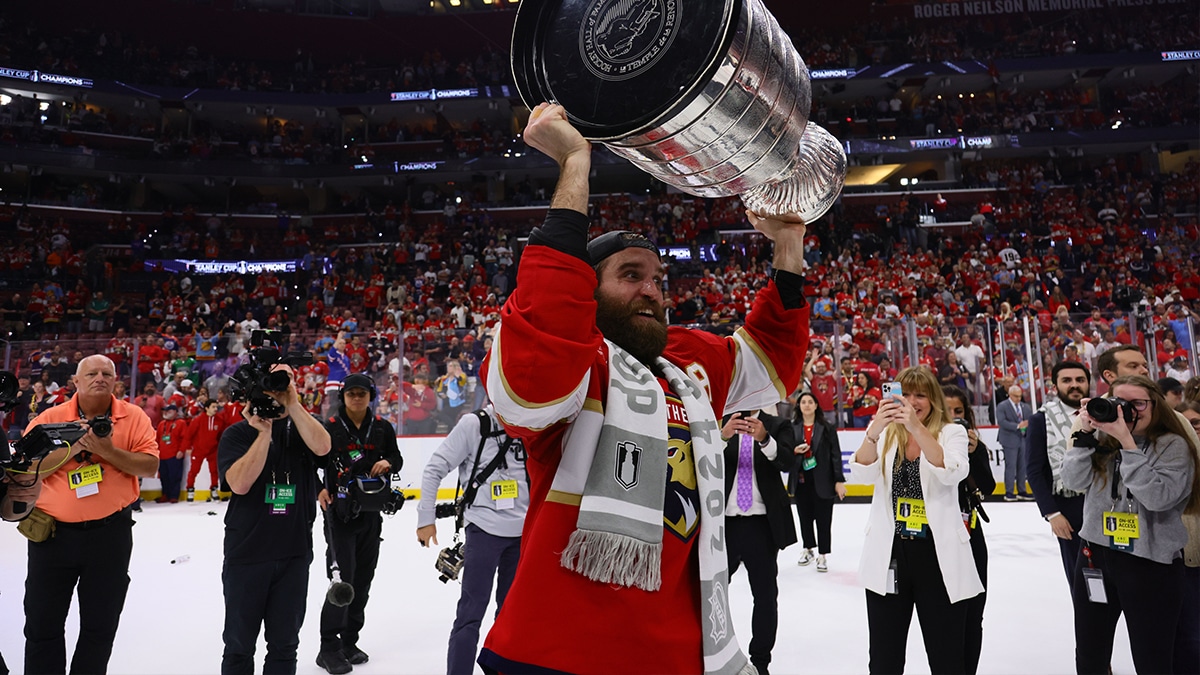 Florida Panthers defenseman Aaron Ekblad (5) hoists the Stanley Cup after defeating Edmonton Oilers in game seven of the 2024 Stanley Cup Final at Amerant Bank Arena.