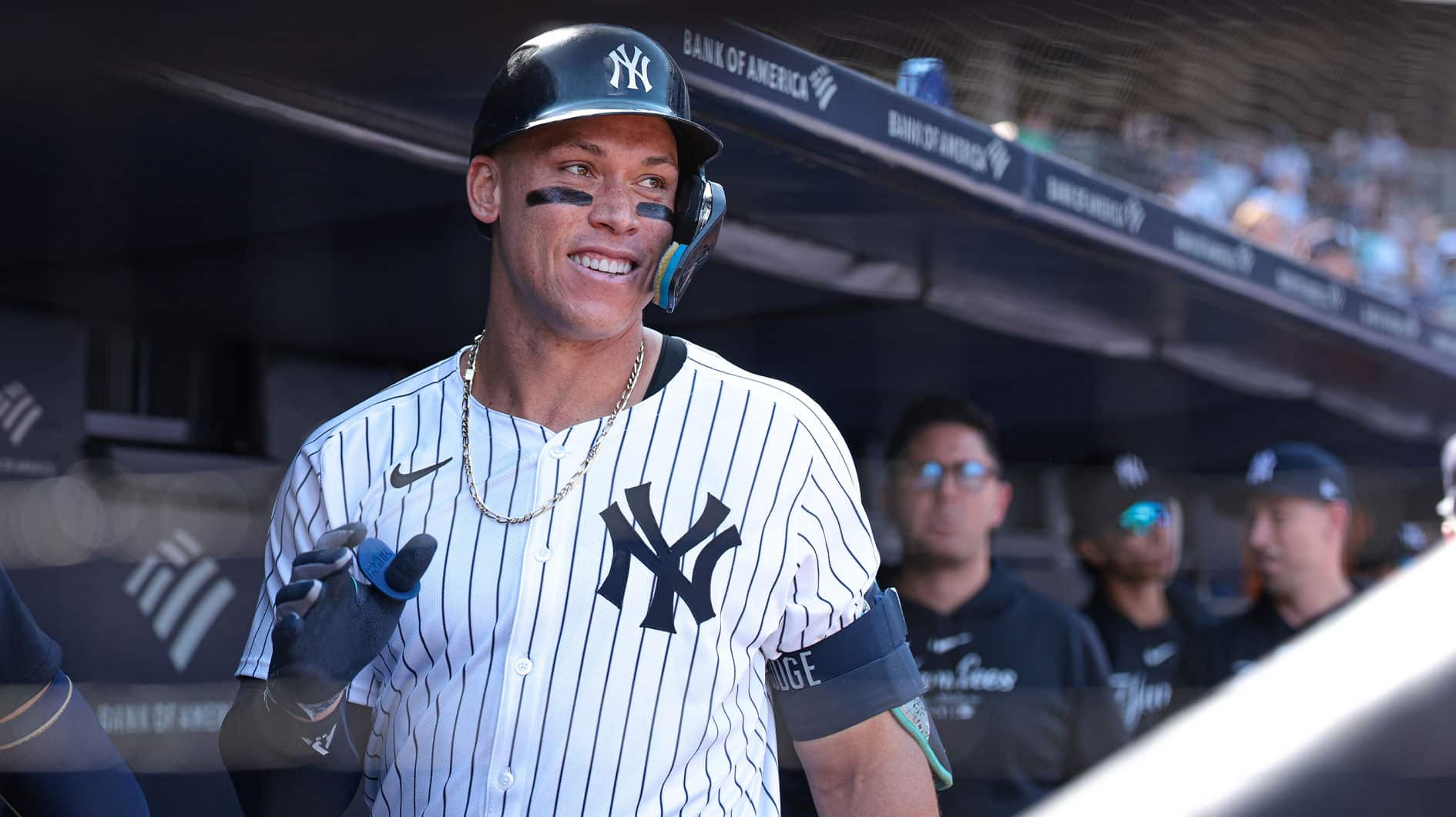 New York Yankees center fielder Aaron Judge (99) reacts in the dugout after his solo home run during the seventh inning against the Texas Rangers at Yankee Stadium.