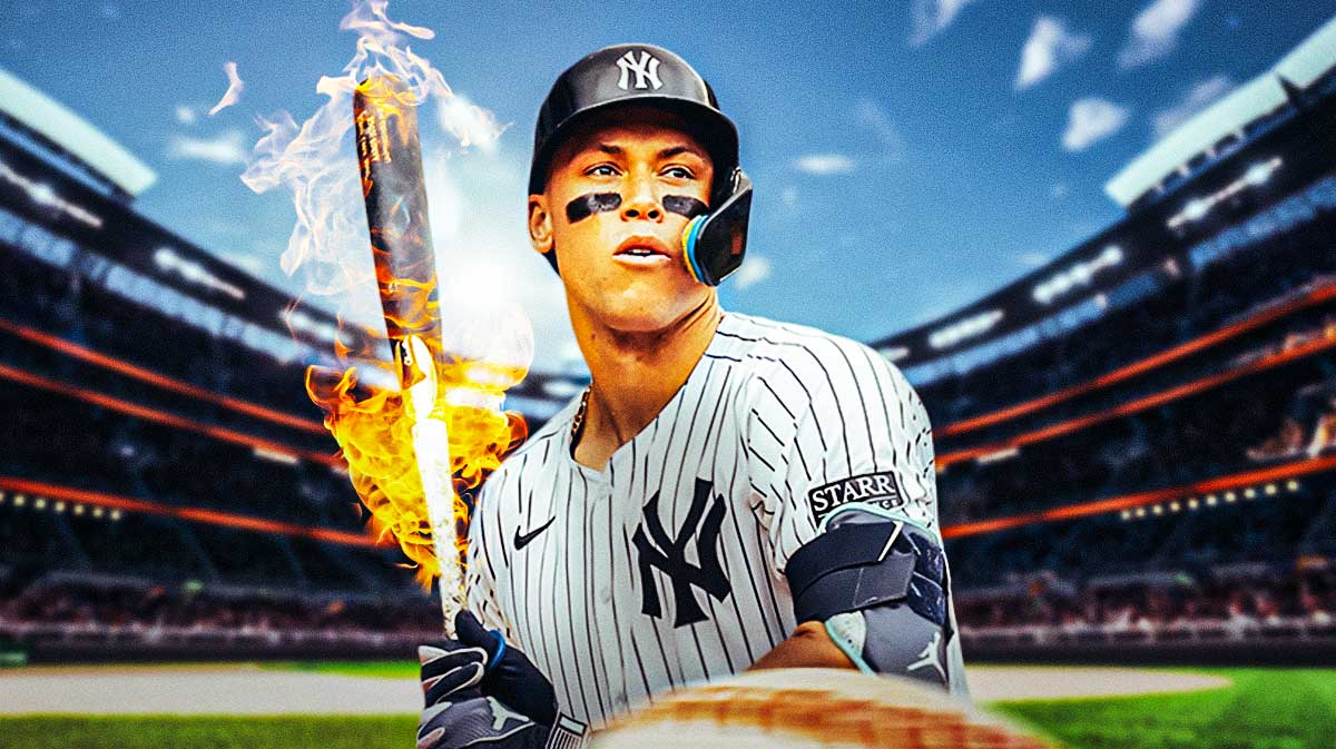 Aaron Judge swinging a bat with flames coming off of it