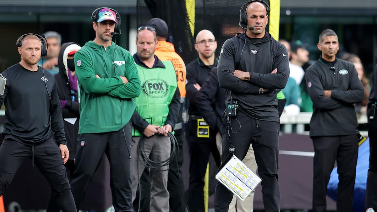 New York Jets injured quarterback Aaron Rodgers (left) and head coach Robert Saleh on the sidelines during the first quarter against the Philadelphia Eagles