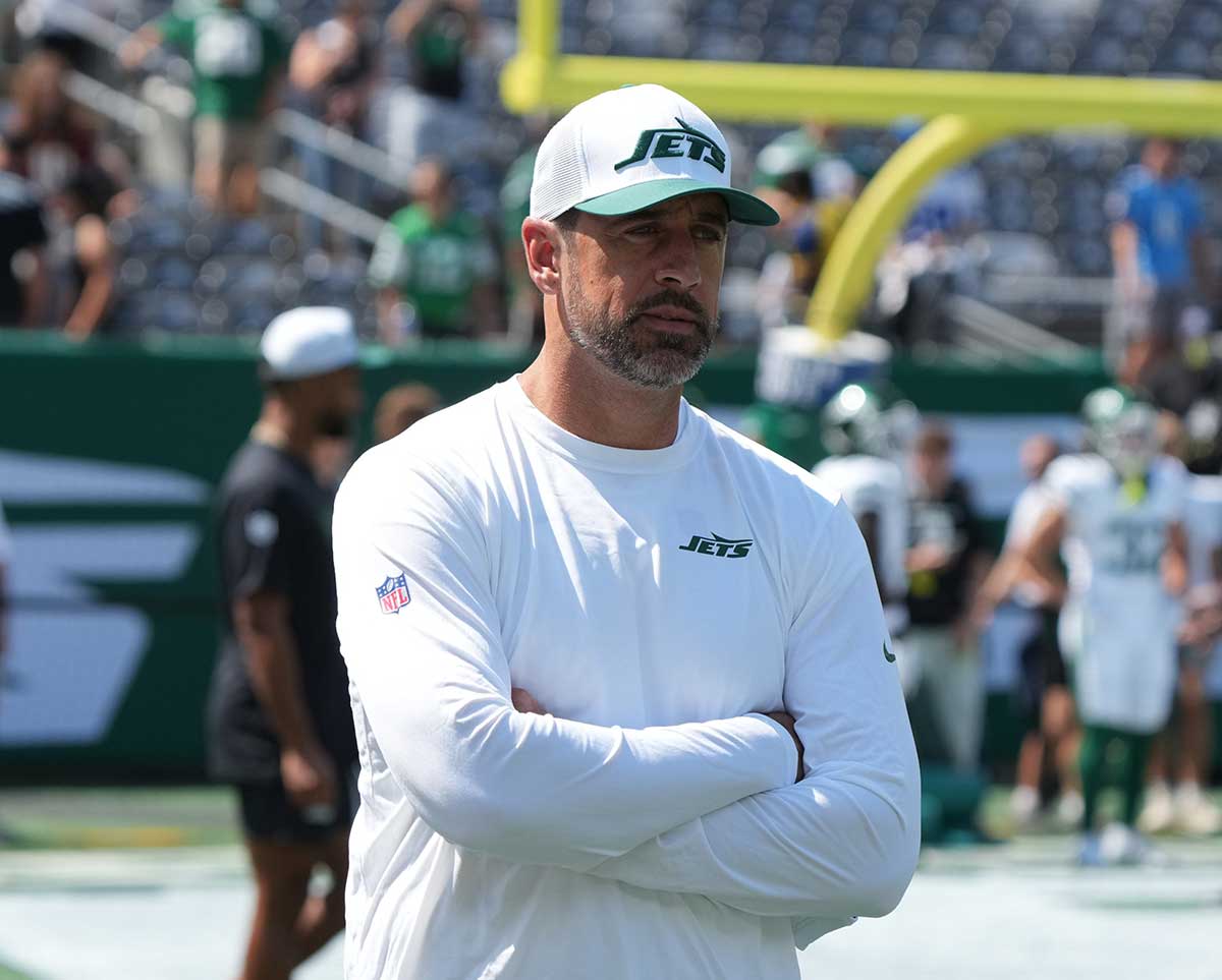  Aaron Rodgers, who wasn't dressed to play, during pre game warm ups as the Washington Commanders came to MetLife Stadium to play the New York Jets.