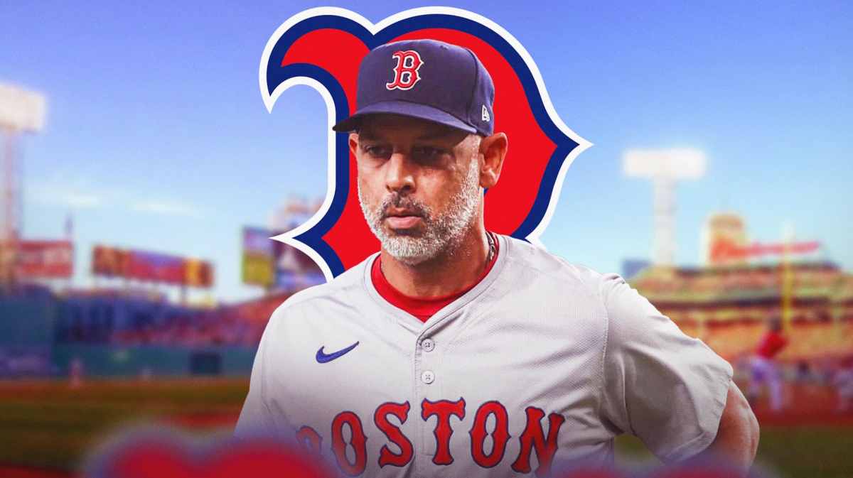 Alex Cora looking sad. Red Sox logo in the background.