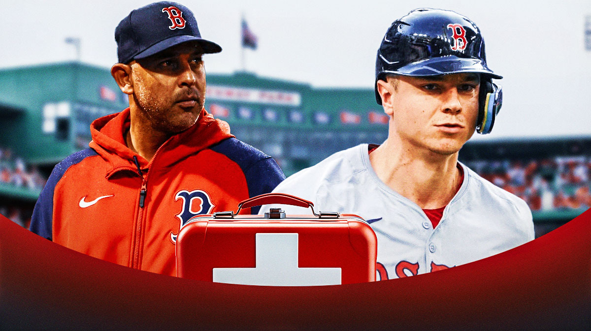 Tyler O'Neill in a Boston Red Sox uniform with a red and white first aid symbol and manager Alex Cora in a Red Sox uniform off to the side as Cora updated the injury status of Red Sox's O'Neill who is important to the Red Sox playoffs hopes.