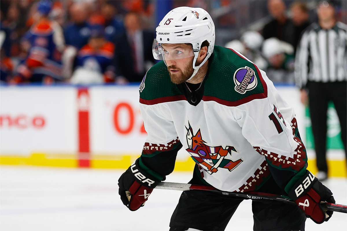 Arizona Coyotes forward Alex Kerfoot (15) waits for play to begin against the Edmonton Oilers at Rogers Place.