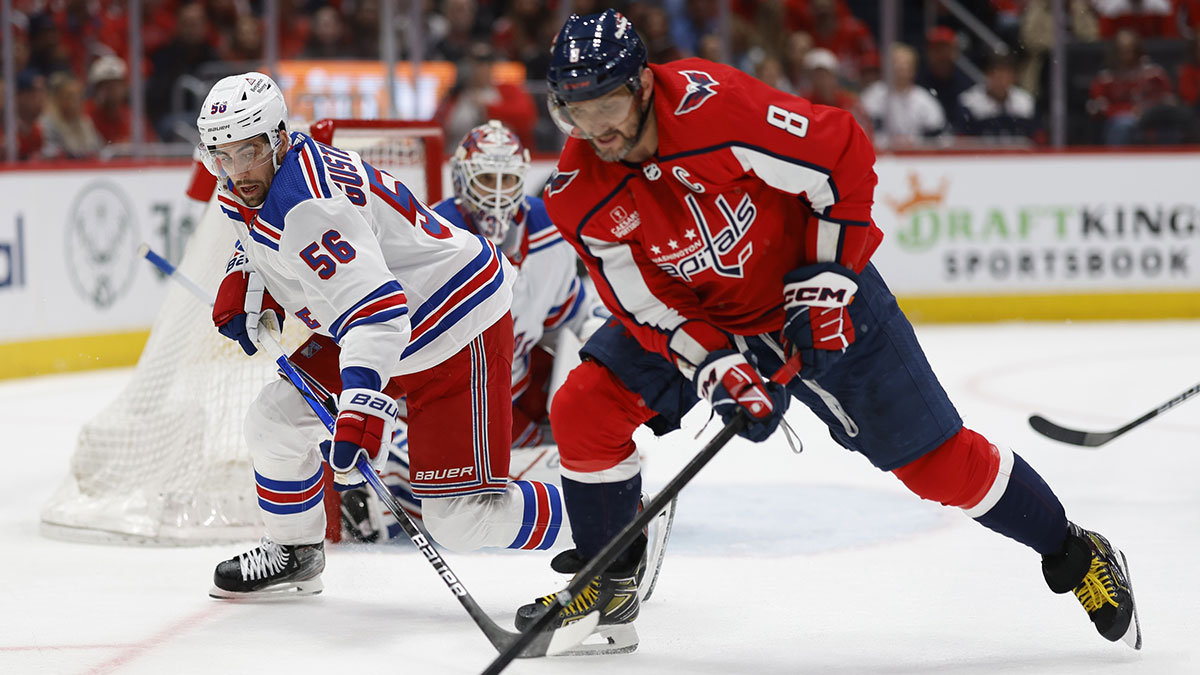     New York Rangers defenseman Erik Gustafsson (56) battles for the puck with Washington Capitals left wing Alex Ovechkin (8) while Rangers goaltender Igor Shesterkin (31) looks on during the third period of Game 3 of the first round of the 2024 Stanley Cup Playoffs at Capital One Arena. 