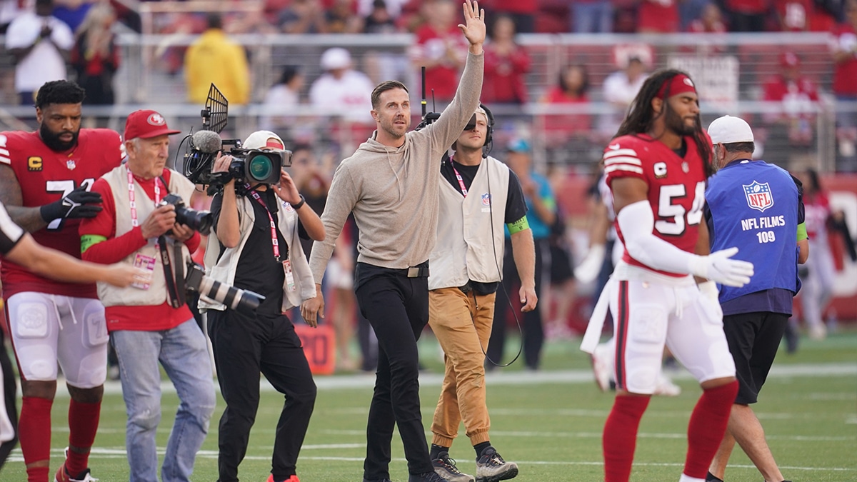 Sep 21, 2023; Santa Clara, California, USA; Former San Francisco 49ers quarterback Alex Smith walks onto the field as the honorary team captain before the game against the New York Giants at Levi's Stadium. 