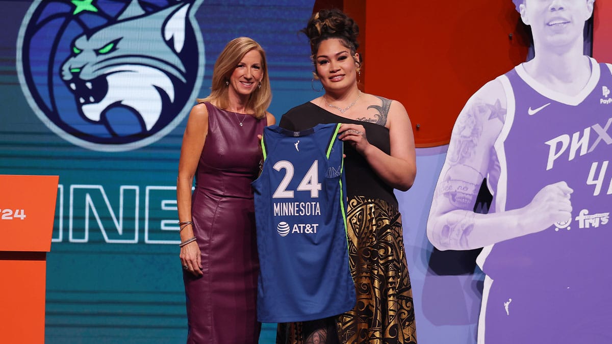 Alissa Pili poses with WNBA commissioner Cathy Engelbert after she is selected with the number eighth overall pick to the Minnesota Lynx in the 2024 WNBA Draft at Brooklyn Academy of Music.