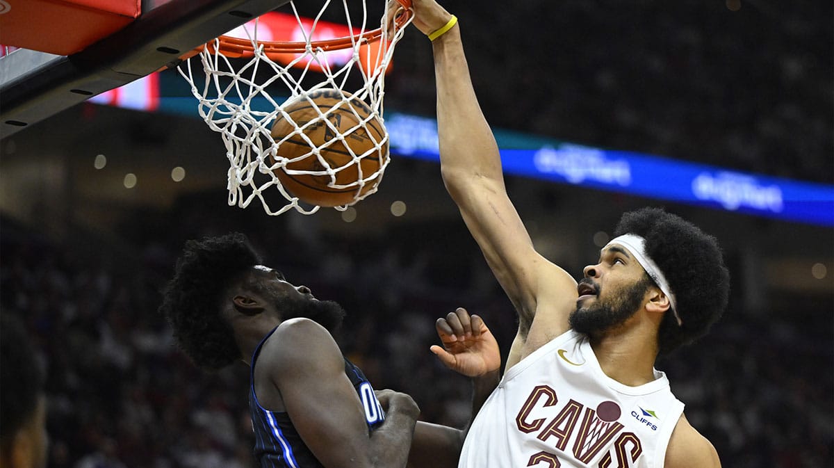 Cleveland Cavaliers center Jarrett Allen (31) dunks beside Orlando Magic forward Jonathan Isaac (1) in the second quarter during game one of the first round for the 2024 NBA playoffs at Rocket Mortgage FieldHouse.