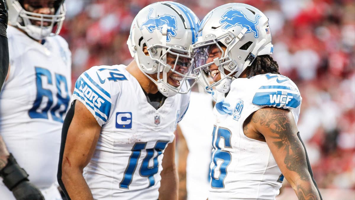 Lions running back Jahmyr Gibbs, right, celebrates a touchdown with wide receiver Amon-Ra St. Brown during the first half of the NFC championship game at Levi's Stadium in Santa Clara, California, on Sunday, Jan. 28, 2024.