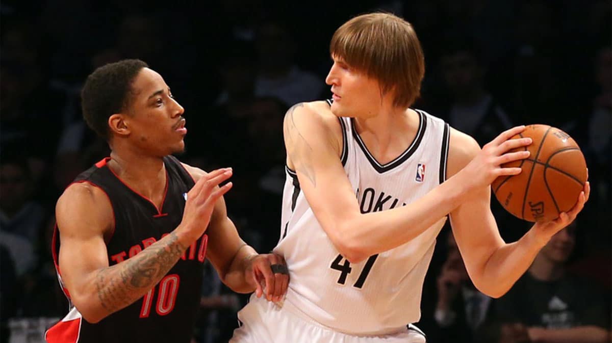 Toronto Raptors guard DeMar DeRozan (10) defends Brooklyn Nets forward Andrei Kirilenko (47) during the second quarter in game three of the first round of the 2014 NBA Playoffs at Barclays Center.