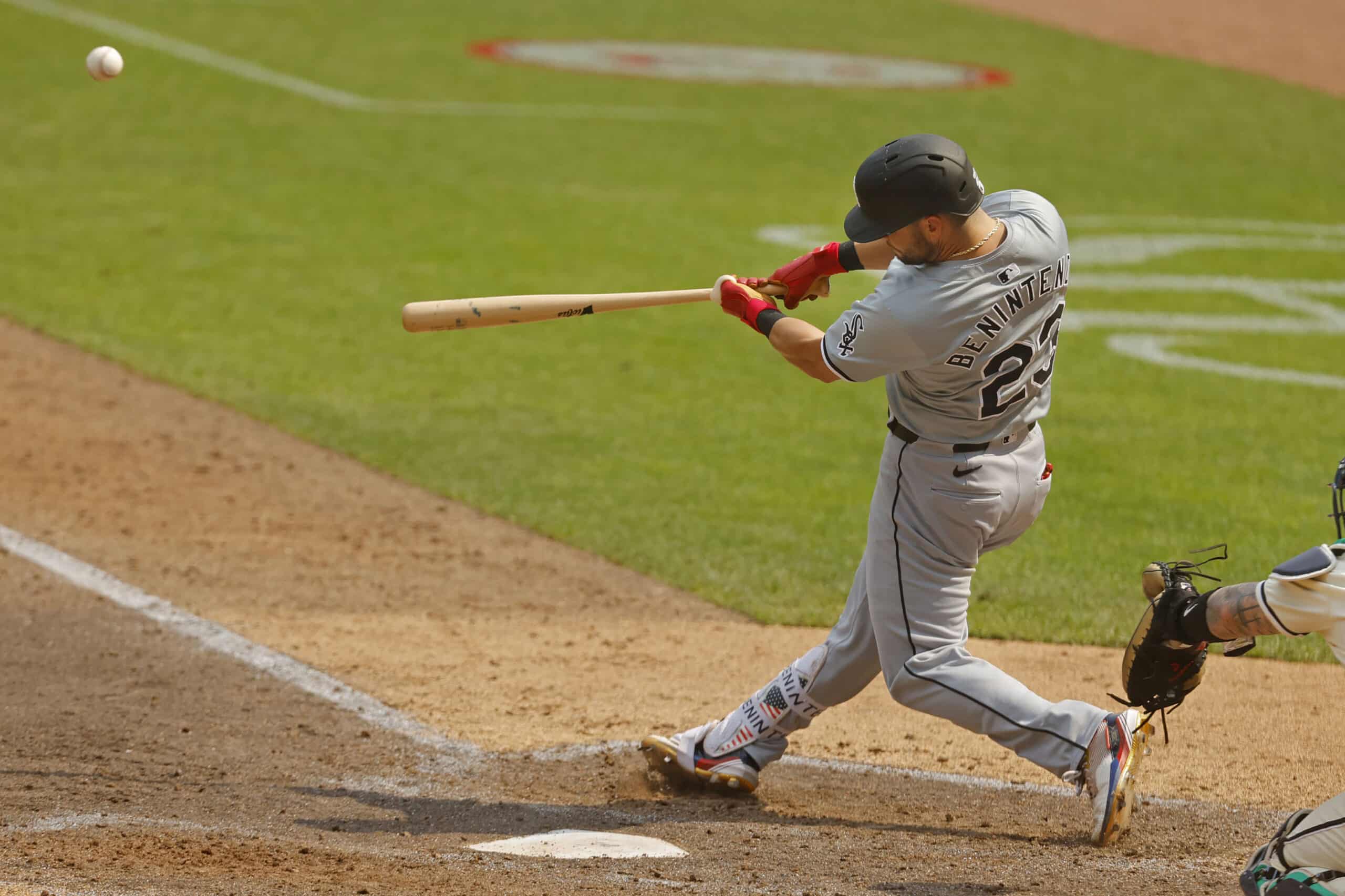 Chicago White Sox left fielder Andrew Benintendi (23) hits a two-run home run against the Minnesota Twins in the seventh inning at Target Field. 