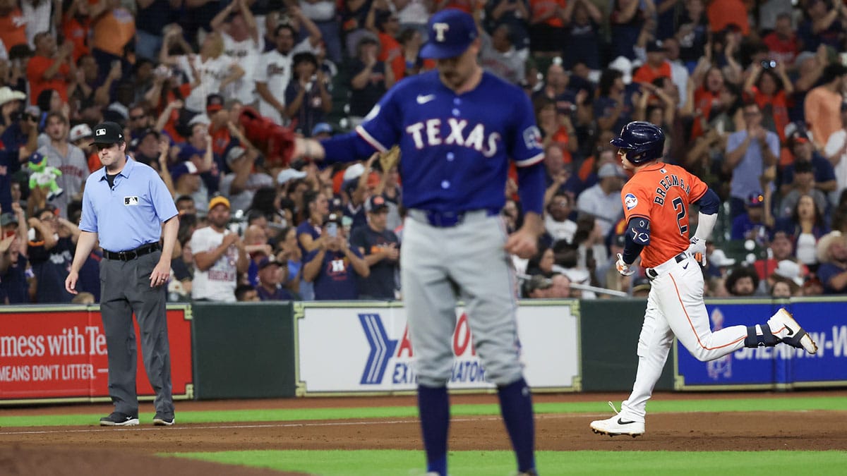 Houston Astros third baseman Alex Bregman (2) rounds the bases after hitting a home run against Texas Rangers starting pitcher Andrew Heaney (44) in the fifth inning at Minute Maid Park. 