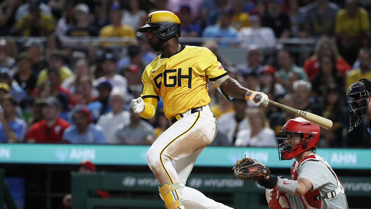 Jul 19, 2024; Pittsburgh, Pennsylvania, USA; Pittsburgh Pirates designated hitter Andrew McCutchen (22) hits a single against the Philadelphia Phillies during the seventh inning at PNC Park. 