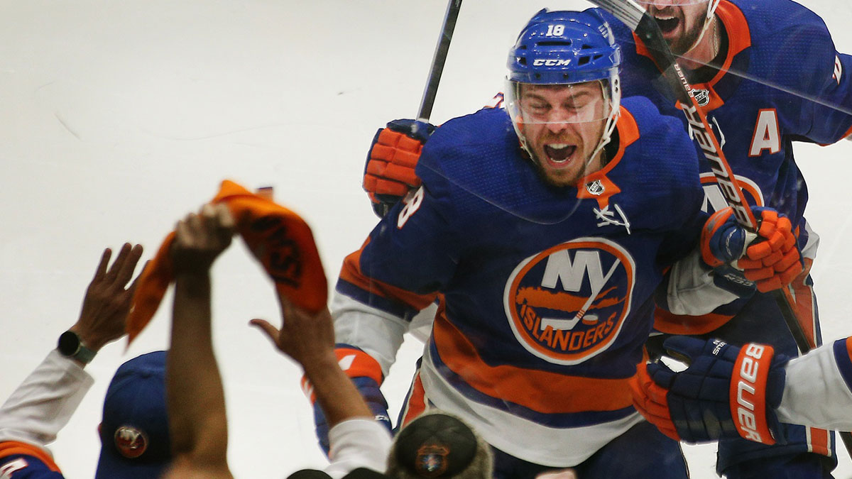     New York Islanders left winger Anthony Beauvillier (18) reacts after scoring the game-winning goal against the Tampa Bay Lightning in overtime in game six of the 2021 Stanley Cup Semifinals at Nassau Veterans Memorial Coliseum. 