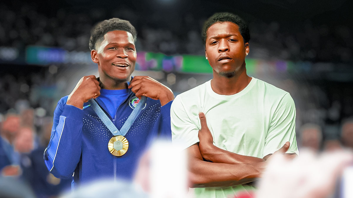 Timberwolves' Anthony Edwards wearing his gold medal from Team USA, with his brother Antony beside him