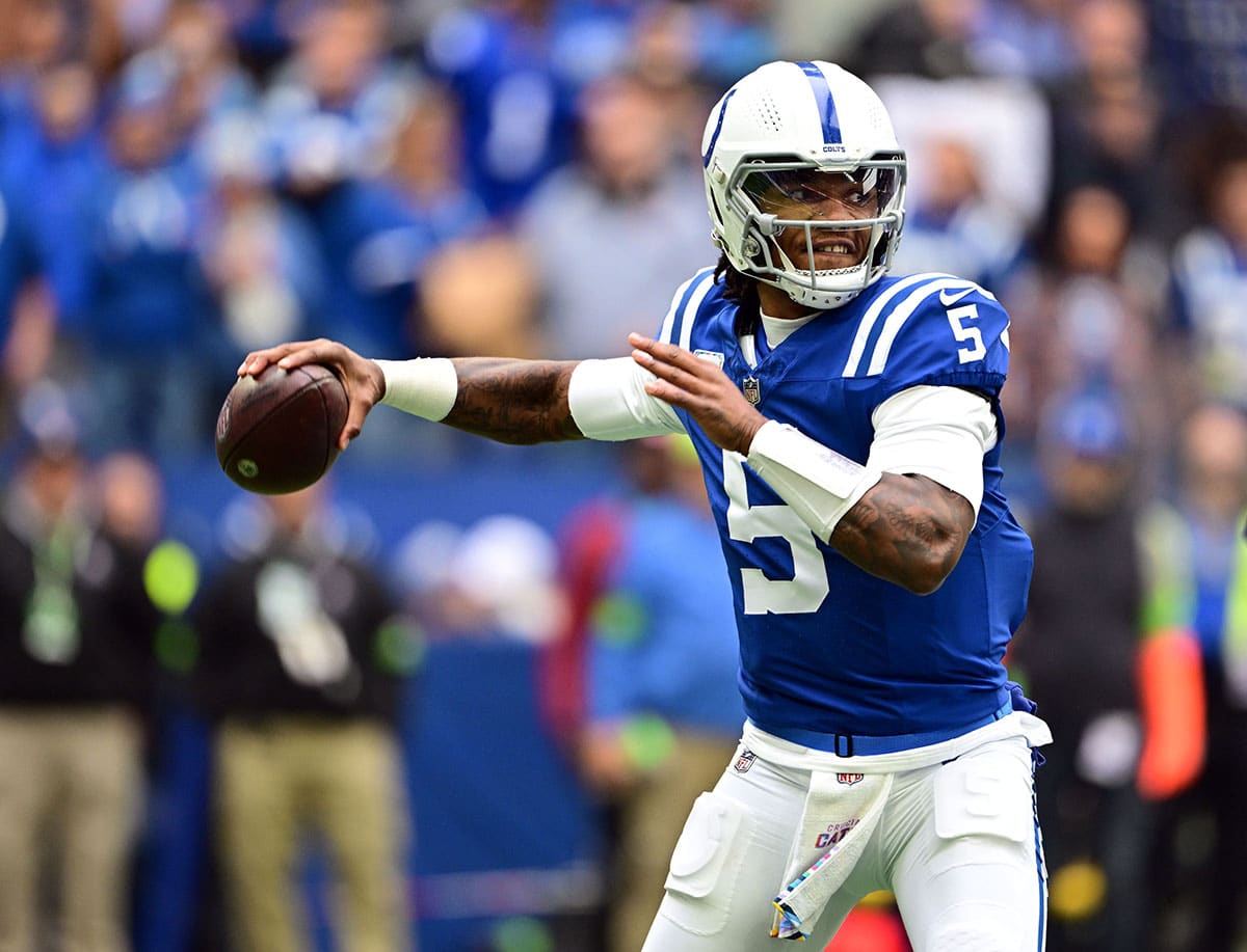 Indianapolis Colts quarterback Anthony Richardson (5) throws a pass during the first quarter against the Tennessee Titans at Lucas Oil Stadium.