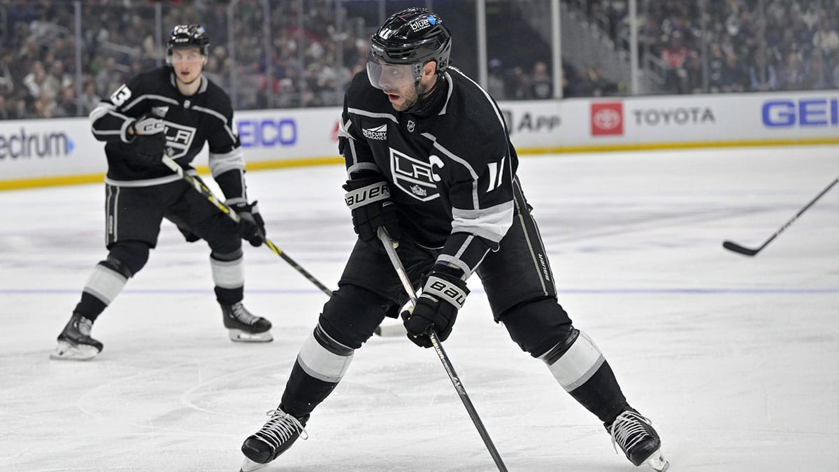 Los Angeles Kings center Anze Kopitar (11) takes a shot on goal in the second period against the New Jersey Devils at Crypto.com Arena. 