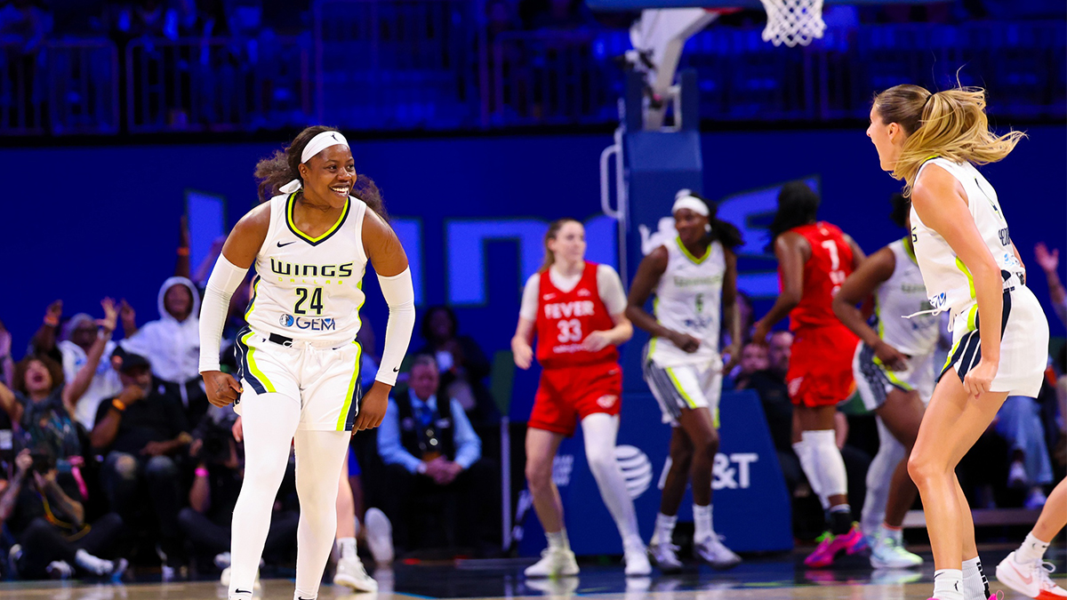Dallas Wings guard Arike Ogunbowale (24) reacts with Dallas Wings guard Jacy Sheldon (4) during the second half against the Indiana Fever at College Park Center.