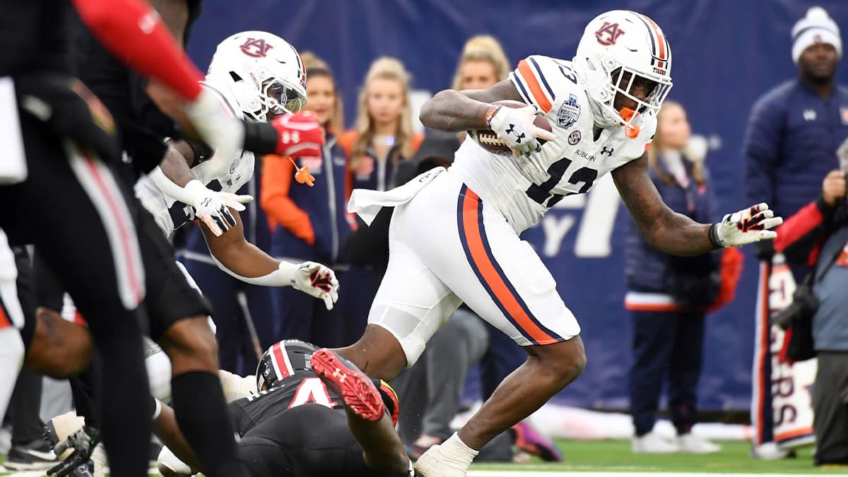 Dec 30, 2023; Nashville, TN, USA; Auburn Tigers tight end Rivaldo Fairweather (13) runs after a catch during the first half against the Maryland Terrapins at Nissan Stadium. Mandatory Credit: Christopher Hanewinckel-USA TODAY Sports