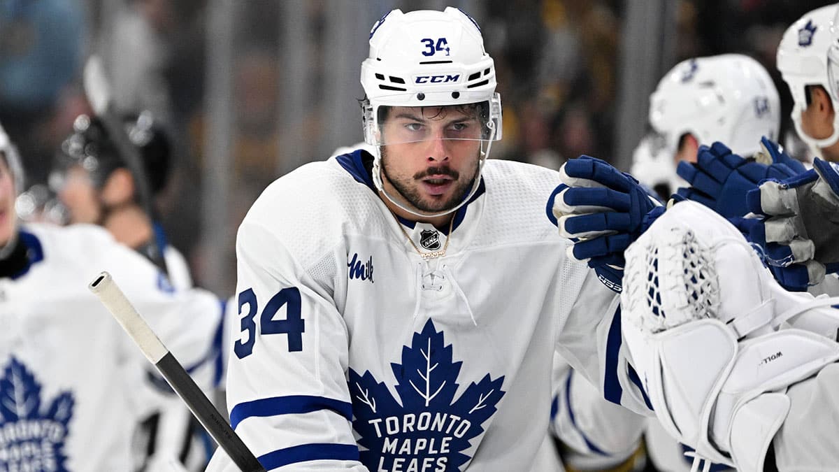 Toronto Maple Leafs center Auston Matthews (34) celebrates with his teammates after scoring a goal against the Boston Bruins during the third period in game two of the first round of the 2024 Stanley Cup Playoffs at TD Garden.