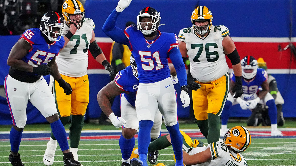 New York Giants linebacker Azeez Ojulari (51) celebrates after making a sack on Green Bay Packers quarterback Jordan Love (10) during the fourth quarter at MetLife Stadium. 