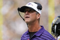 Baltimore Ravens head coach John Harbaugh looks on during the first quarter against the Green Bay Packers at Lambeau Field.