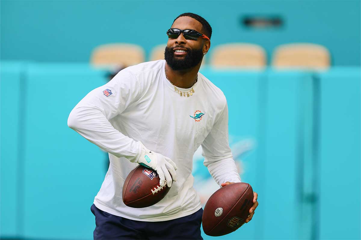 Miami Dolphins wide receiver Odell Beckham Jr. (3) throws the football before preseason game against the Washington Commanders at Hard Rock Stadium.