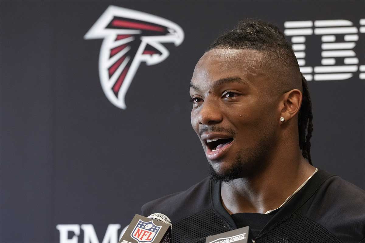 Atlanta Falcons running back Bijan Robinson (7) is interviewed after OTA at the Falcons Training facility.