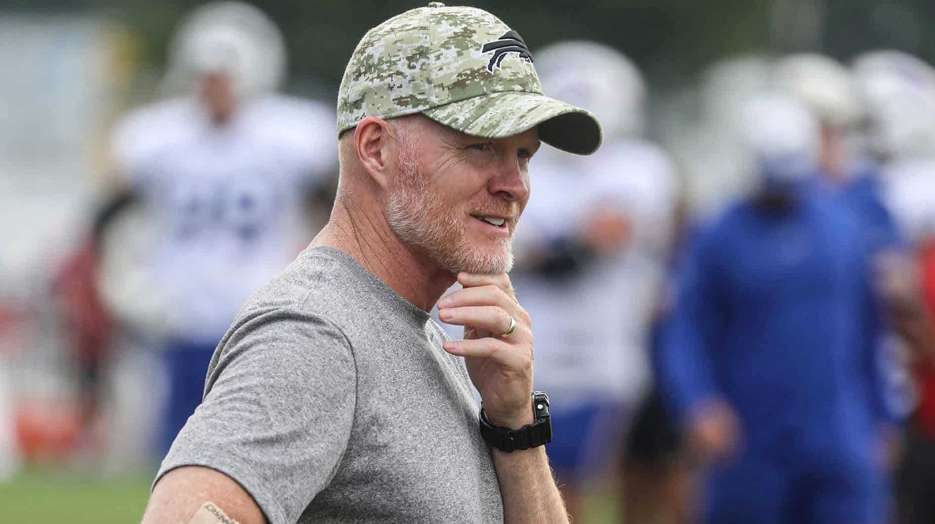 Bills Head Coach Sean McDermott talks to someone on the sidelines during Bills training camp