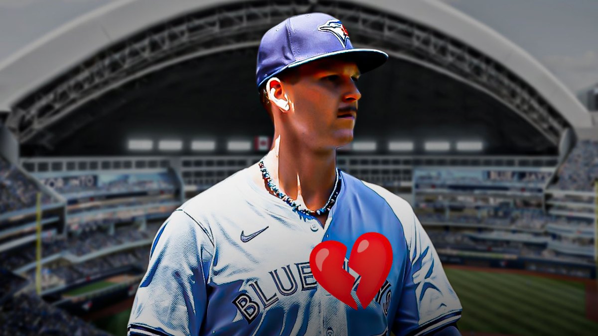 Bowden Francis in a Toronto Blue Jays uniform looking unhappy with a red broken heart on his chest as the Blue Jays' pitcher lost a no hitter in the ninth inning.