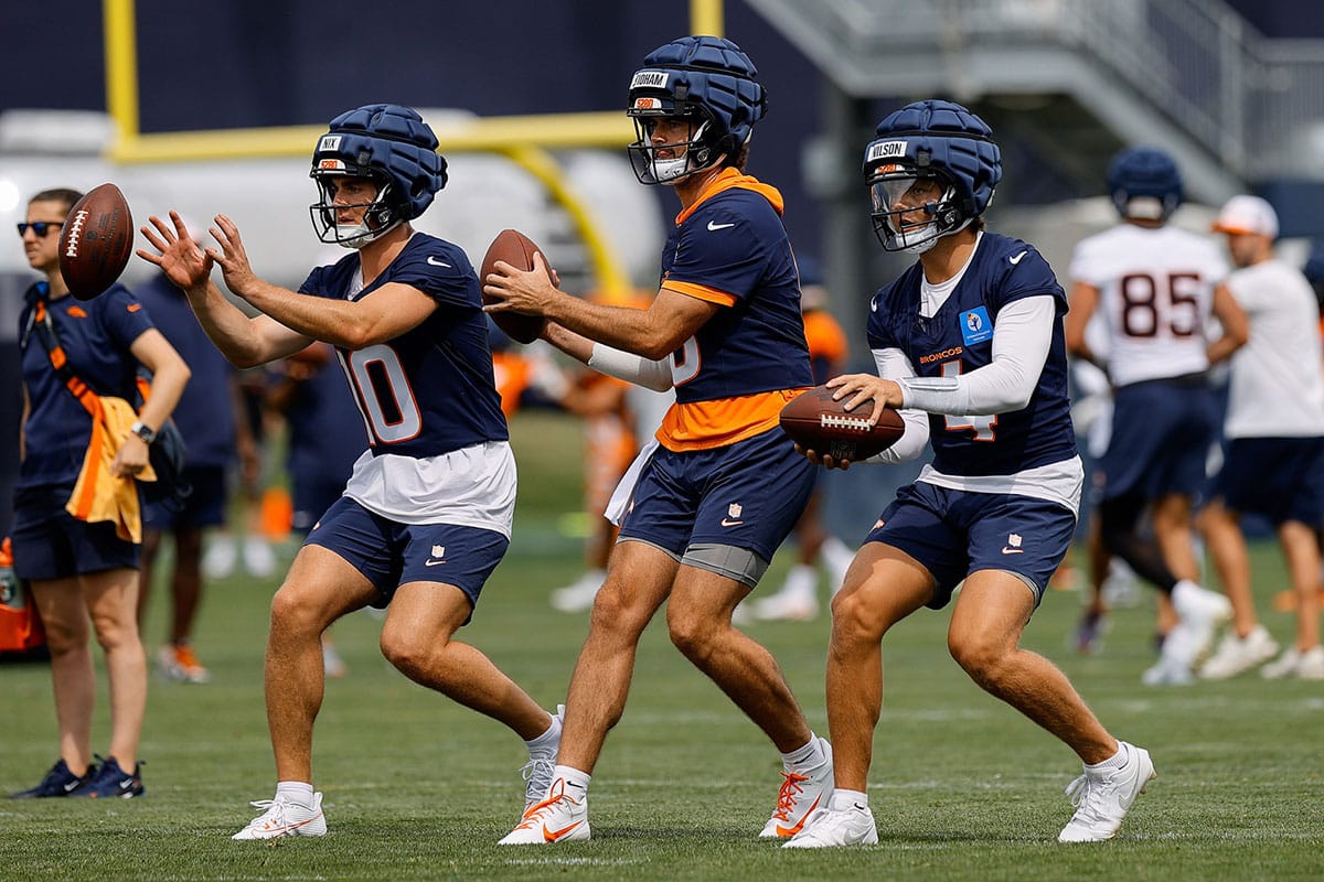 Denver Broncos quarterback Bo Nix (10) and quarterback Jarrett Stidham (8) and quarterback Zach Wilson (4) during training camp at Broncos Park Powered by CommonSpirit. 