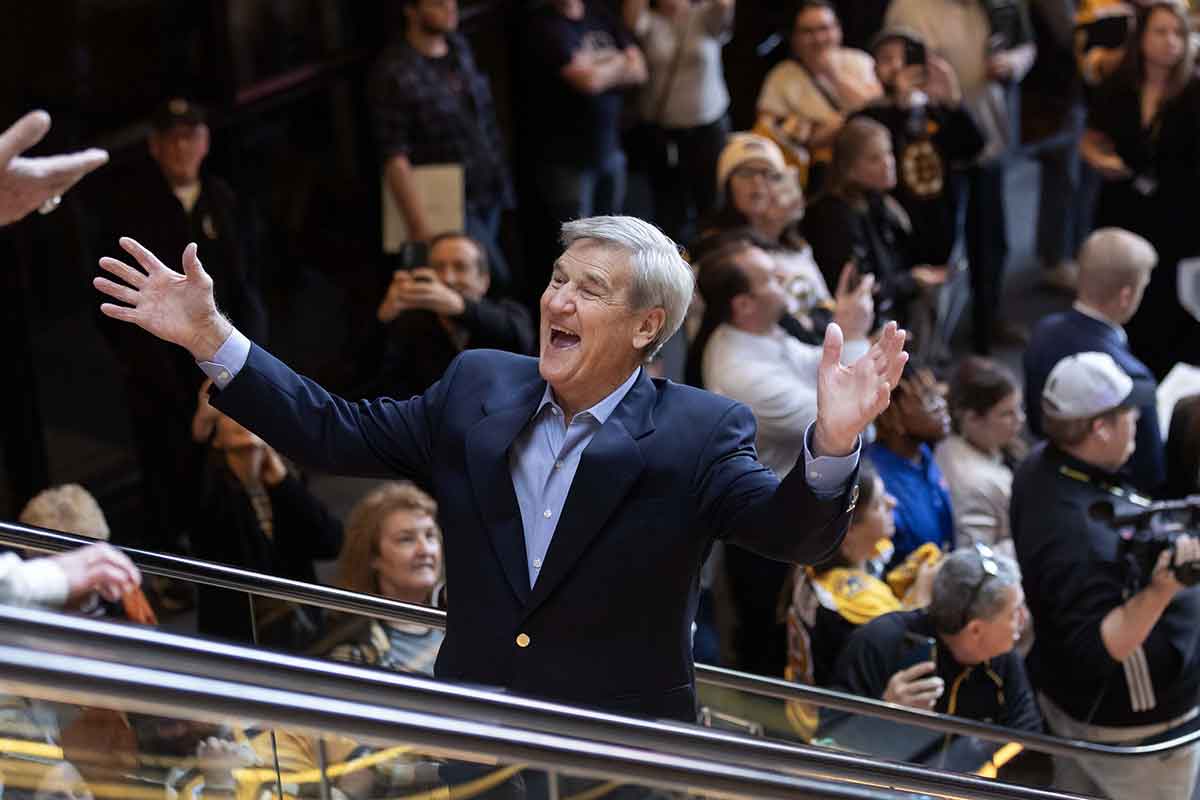 Boston Bruins Hall of Famer Bobby Orr greets other former players as he enters TD Garden during ceremonies honoring the Boston Bruins 100th year in the NHL. 