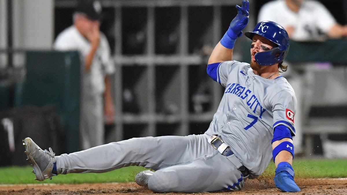 Kansas City Royals shortstop Bobby Witt Jr. (7) slides into home plate to score a run during the eighth inning against the Chicago White Sox at Guaranteed Rate Field.