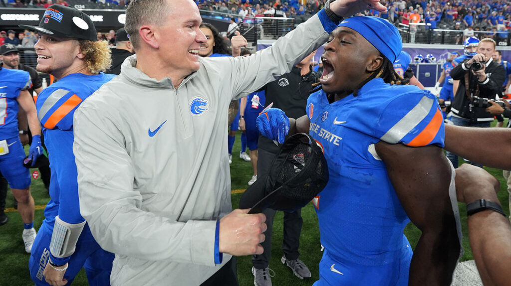 Boise State Broncos head coach Spencer Danielson celebrates with running back Ashton Jeanty (2) after 44-20 victory over the UNLV Rebels in the Mountain West Championship at Allegiant Stadium.