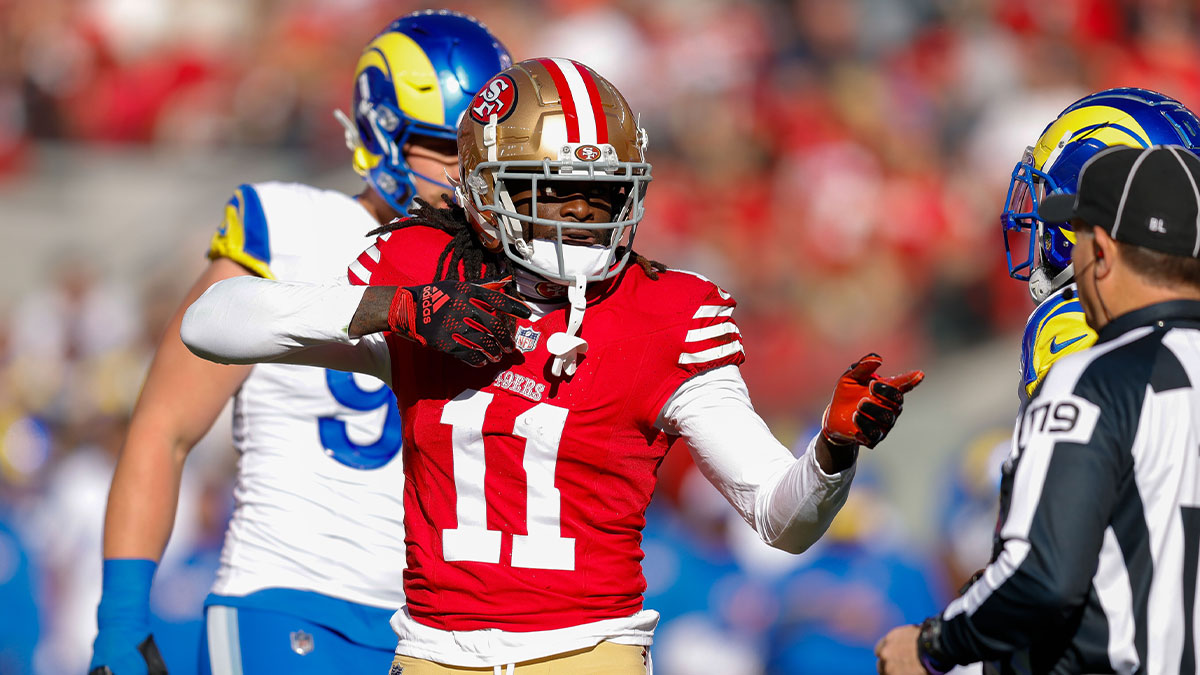 San Francisco 49ers wide receiver Brandon Aiyuk (11) celebrates after a play against the Los Angeles Rams during the first quarter at Levi's Stadium.