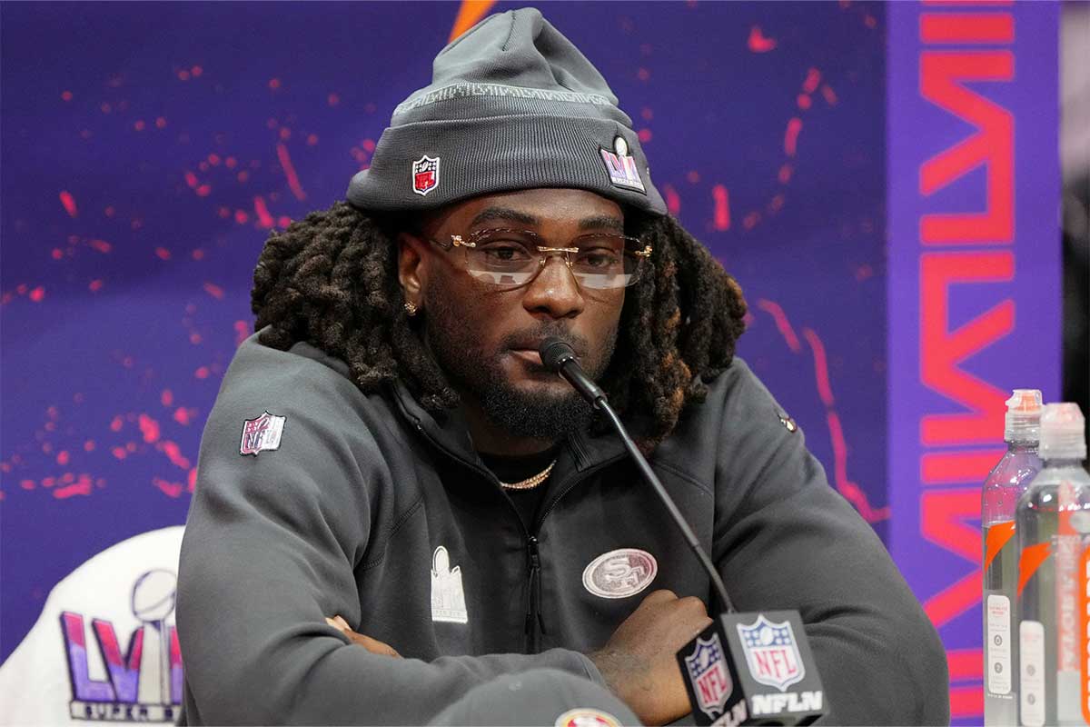 San Francisco 49ers wide receiver Brandon Aiyuk (11) talks to the media during Super Bowl LVIII Opening Night at Allegiant Stadium.