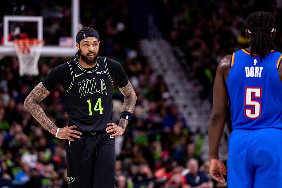 New Orleans Pelicans forward Brandon Ingram (14) looks on against Oklahoma City Thunder guard Luguentz Dort (5) during the first half of game four of the first round for the 2024 NBA playoffs at Smoothie King Center.