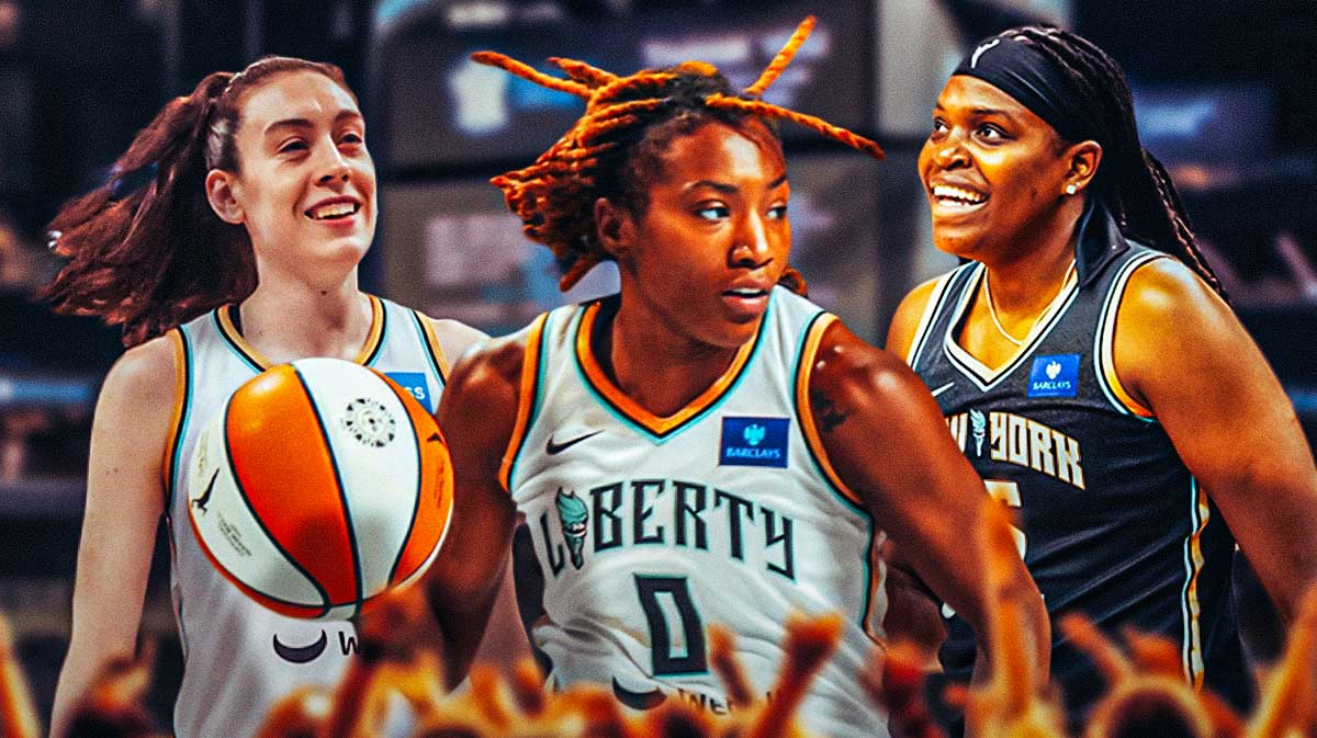 Jaylyn Sherrod (Liberty) action shot. Breanna Stewart (Liberty) and Jonquel Jones (Liberty) behind her with positive facial expressions at a sold-out Barclays Center