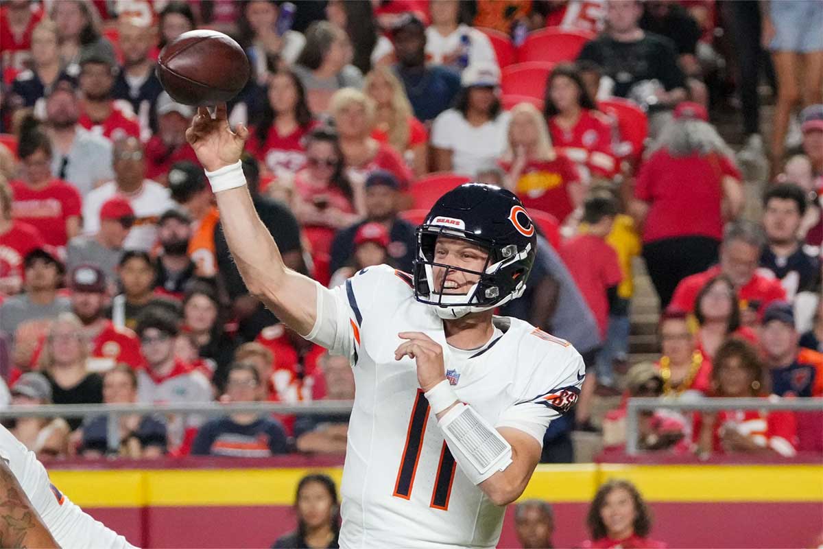 Chicago Bears quarterback Brett Rypien (11) throws a pass against the Kansas City Chiefs during the first half at GEHA Field at Arrowhead Stadium. 