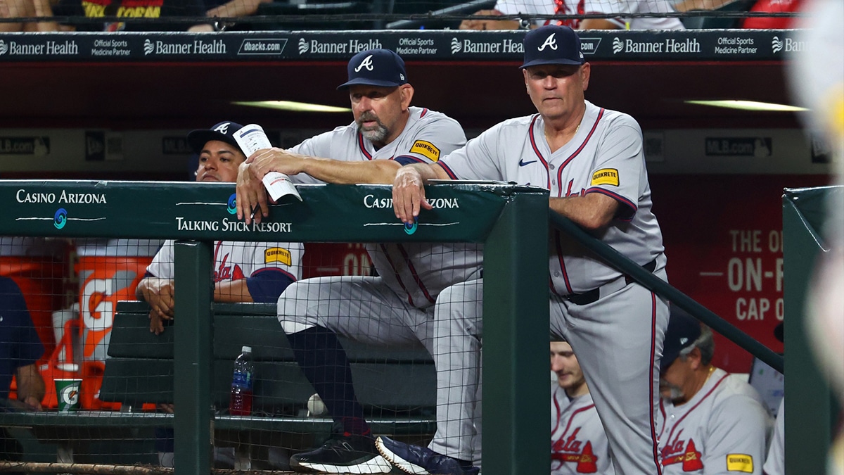 Atlanta Braves manager Brian Snitker (right) and bench coach Walt Weiss against the Arizona Diamondbacks at Chase Field.