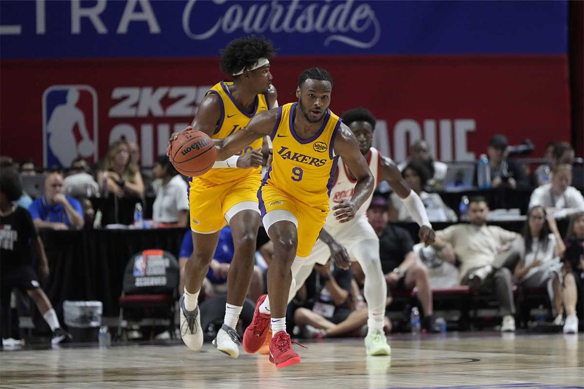 Los Angeles Lakers guard Bronny James (9) dribbles the ball during the second half against the Houston Rockets at the Thomas & Mack Center. 