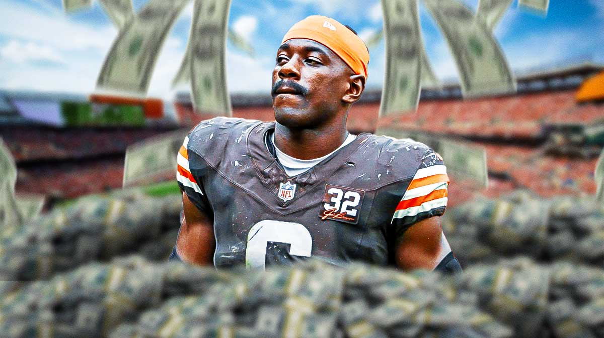 Jeremiah Owusu-Koramoah (JOK) in a Browns jersey with money everywhere.