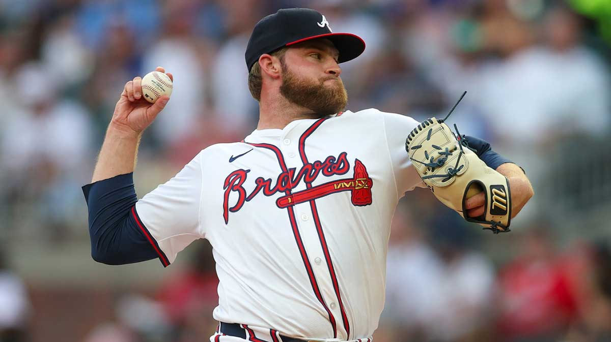 Atlanta Braves starting pitcher Bryce Elder (55) throws against the Milwaukee Brewers in the first inning at Truist Park.