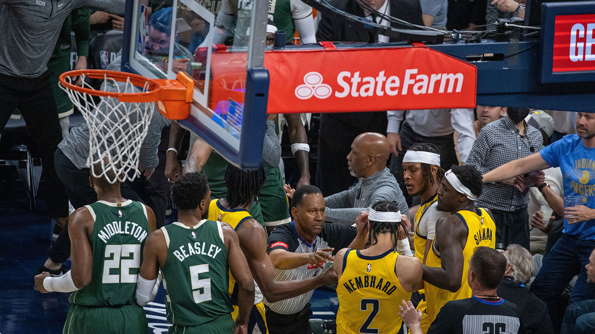 Indiana Pacers guard Andrew Nembhard (2) and Milwaukee Bucks forward Bobby Portis (9) get into a fight during game four of the first round for the 2024 NBA playoffs at Gainbridge Fieldhouse