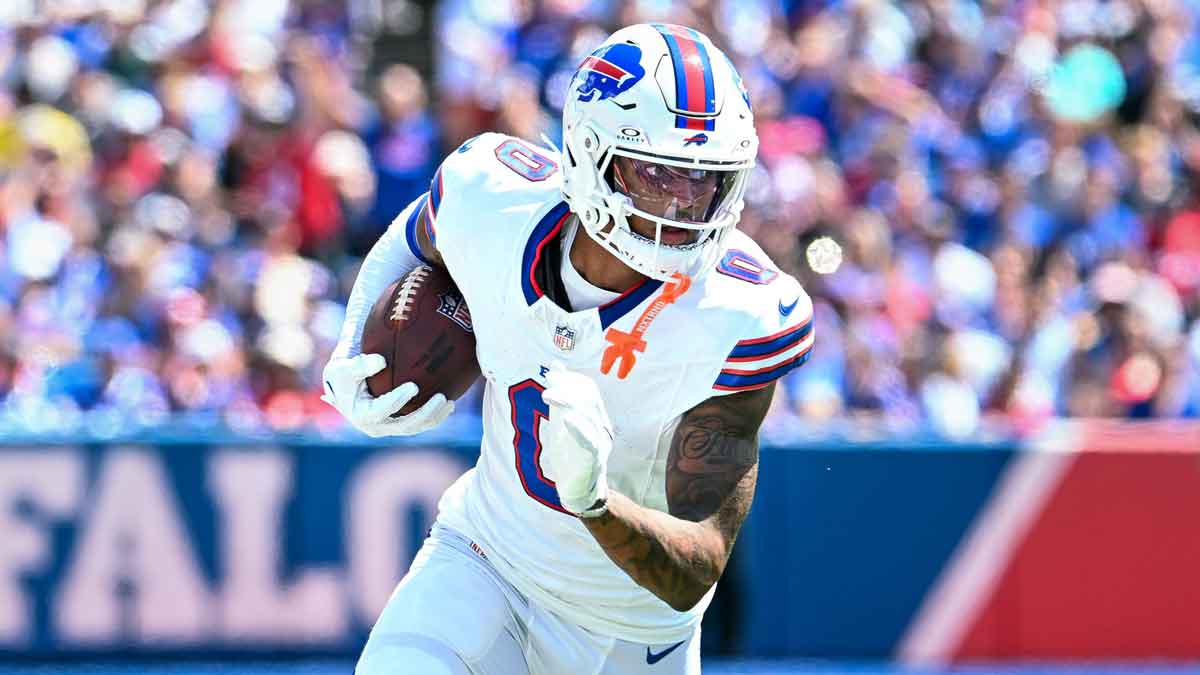 Buffalo Bills wide receiver Keon Coleman (0) runs with the ball after a catch in the second quarter of a pre-season game against the Chicago Bears at Highmark Stadium.