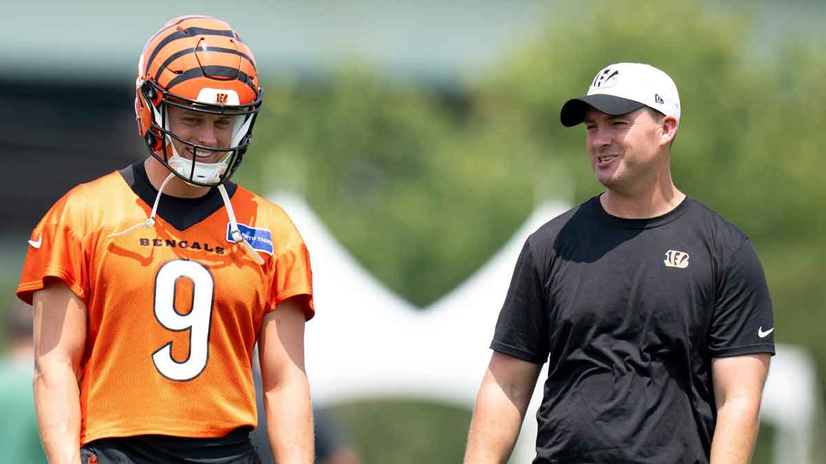 Cincinnati Bengals quarterback Joe Burrow (9) talks with Cincinnati Bengals head coach Zac Taylor during Cincinnati Bengals training camp in Cincinnati on Friday, July 26, 2024.