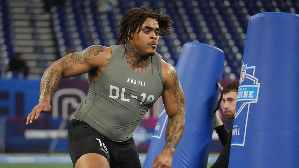 Texas defensive lineman Byron Murphy (DL18) works out during the 2024 NFL Combine at Lucas Oil Stadium. 