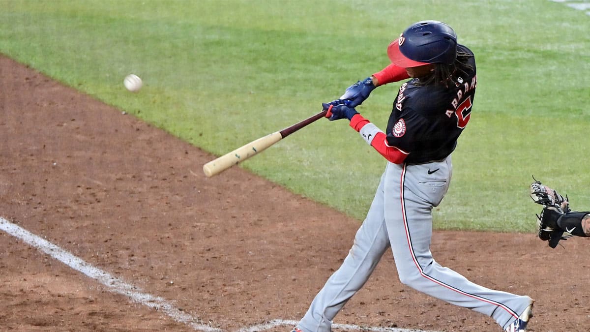 Washington Nationals shortstop CJ Abrams (5) hits an RBI double in the ninth inning against the Arizona Diamondbacks at Chase Field.