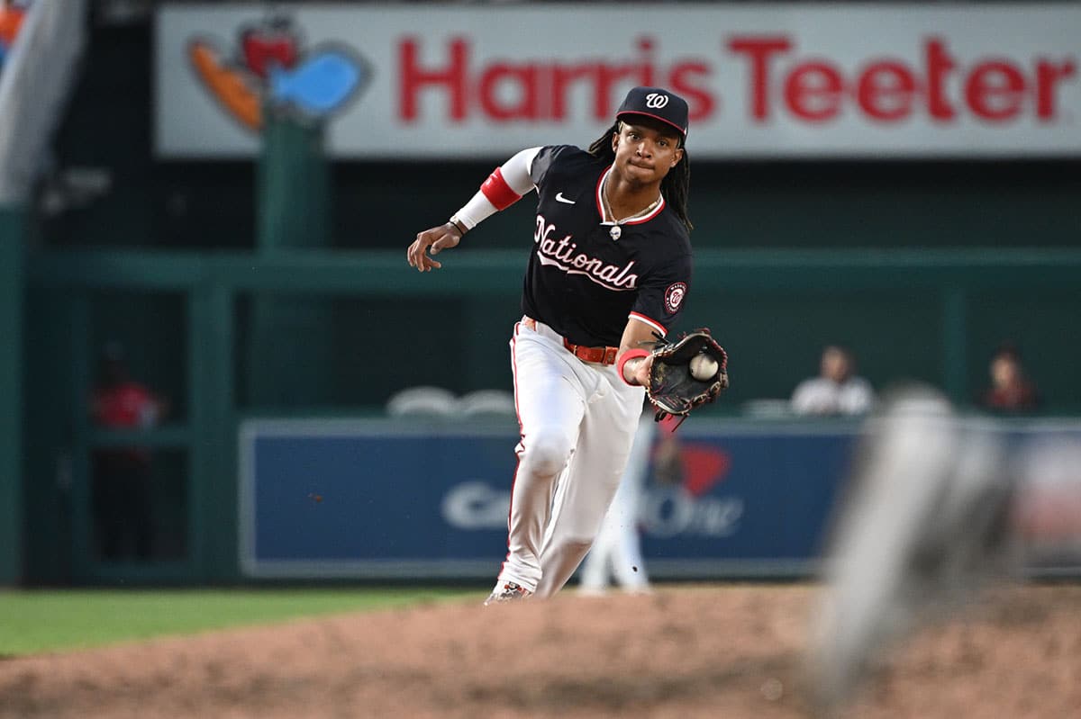 Aug 5, 2024; Washington, District of Columbia, USA; Washington Nationals shortstop CJ Abrams (5) fields a ground ball against the San Francisco Giants during the sixth inning at Nationals Park. 