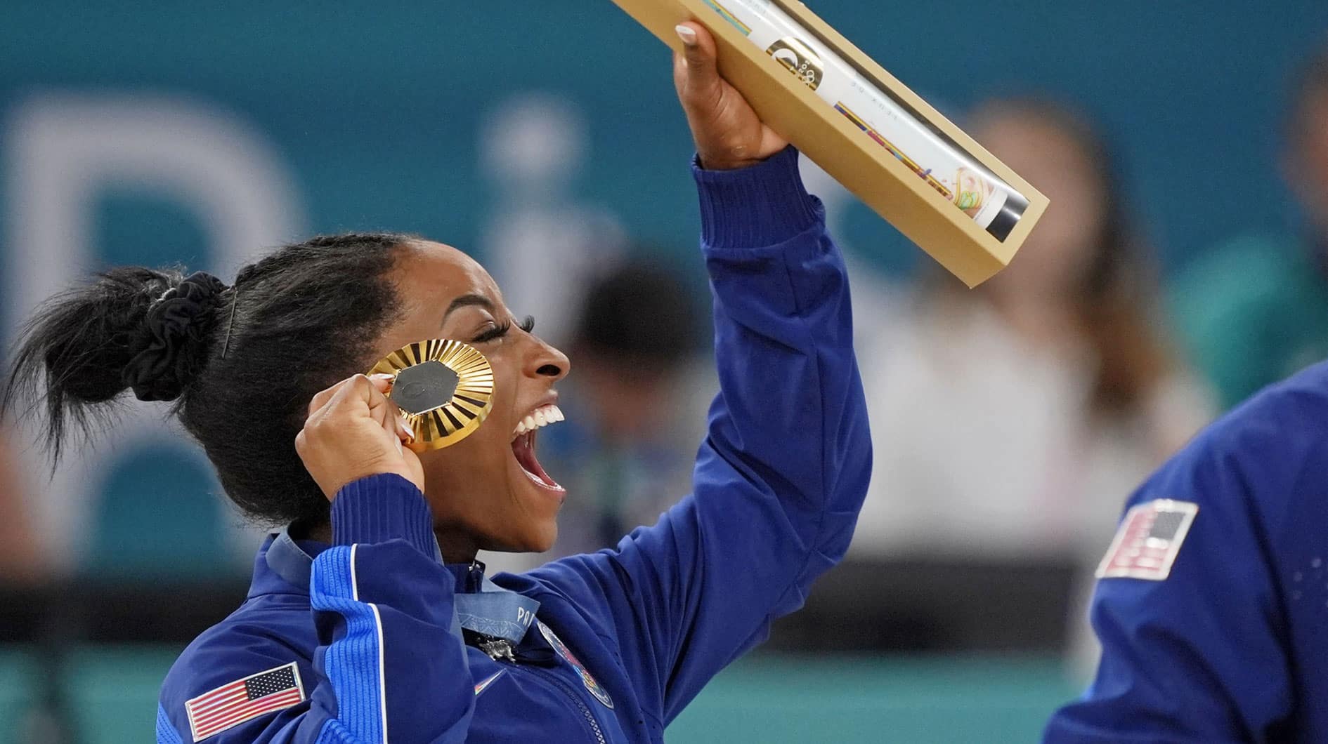 Simone Biles of the United States celebrates after winning the gold medal in the womenís gymnastics all-around during the Paris 2024 Olympic Summer Games at Bercy Arena. 